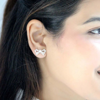 Silver Pearl-kissed Bow Earrings