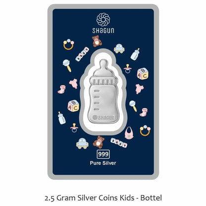 A Shagun Coins 2.5 gram pure silver baby bottle coin presented on its dark navy blue backing card, which features baby-themed illustrations.